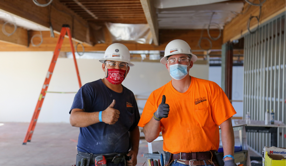 Prime Employees Giving Thumbs-Up