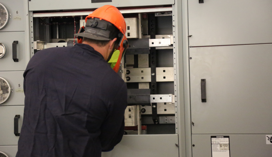 Service Electrician Wearing Protective Gear